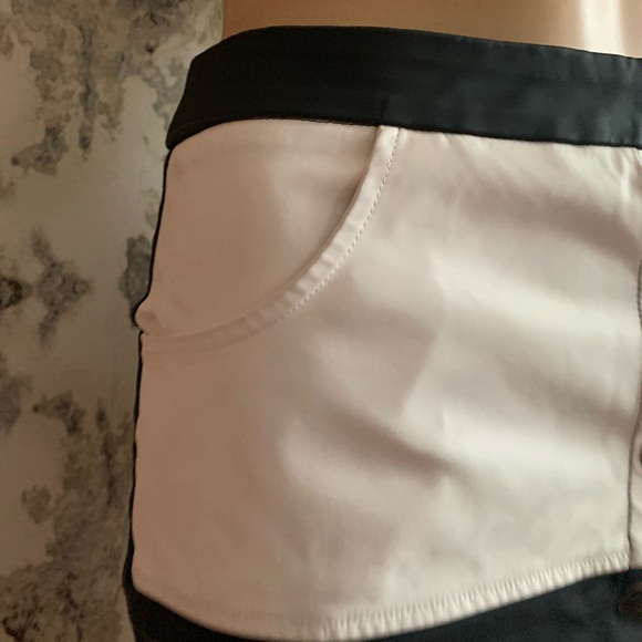 FAUX LEATHER TWO TONE BUTTON UP SKIRT WITH POCKETS - Picture 3 of 4